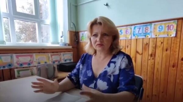 Rukovodilac odeljenja za obrazovanje jednog od okruga Harkovske oblasti  - Sputnik Srbija