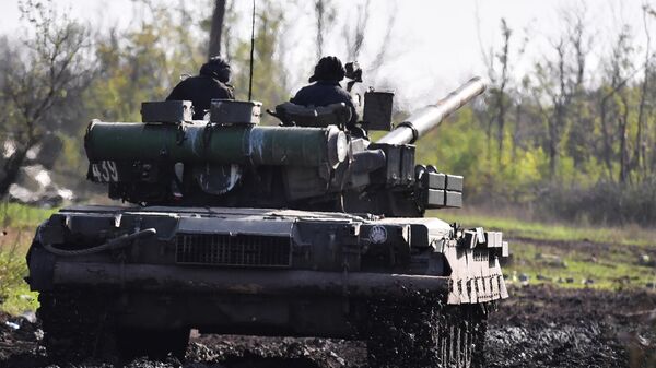 Посада тенка Т-80 Народне милиције ДНР у зони специјалне војне операције - Sputnik Србија