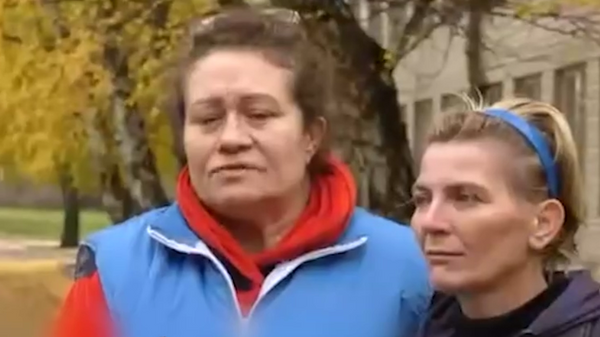 Жена из Купјанска прича како се са децом крила од украјинског гранатирања - Sputnik Србија