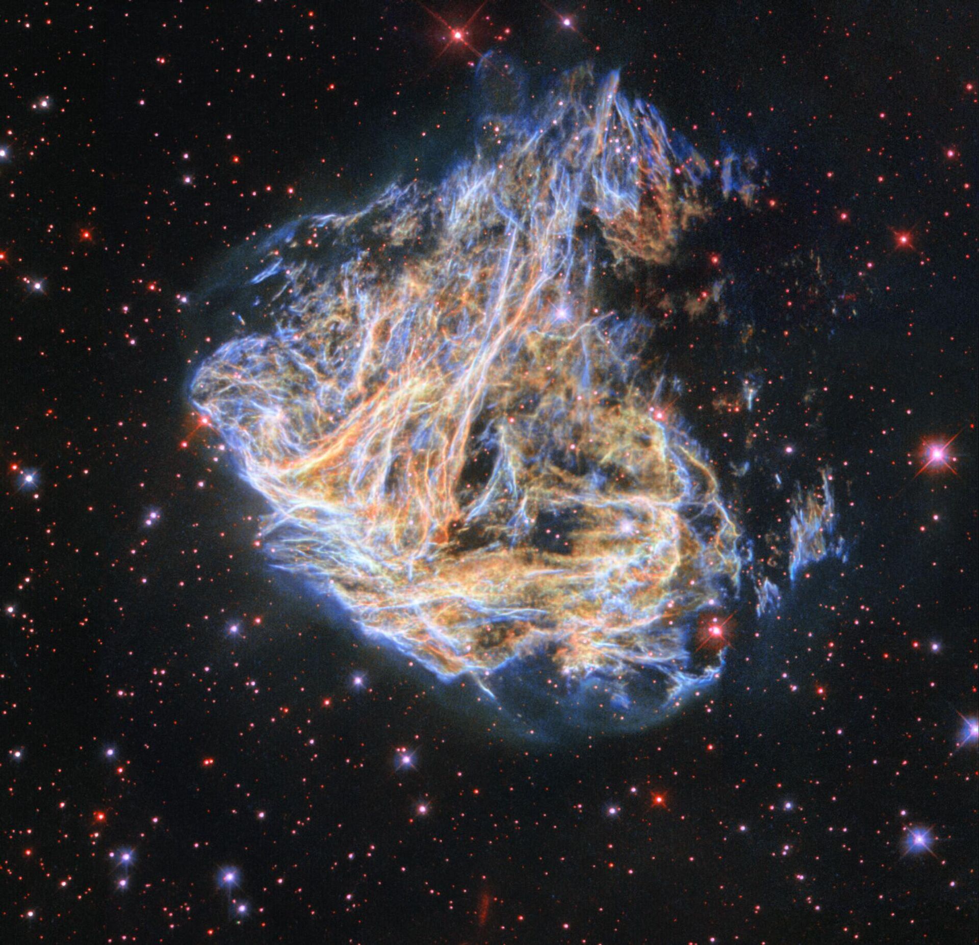 O Telescópio Espacial Hubble da NASA registrou os fragmentos da remanescente de supernova colorida DEM L 190 - Sputnik Srbija, 1920, 28.11.2022