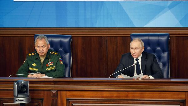 Председник Русије Владимир Путин и руски министар одбране Сергеј Шојгу - Sputnik Србија