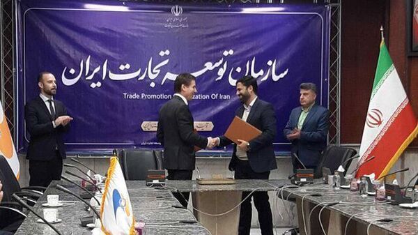 Ministar trgovine Evroazijske ekonomske komisije Andrej Slepnjev i šef Organizacije za razvoj trgovine Irana Ali Reza Pejman - Sputnik Srbija