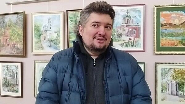 Ruski sveštenik koji je oslobođen u razmeni zarobljenika  - Sputnik Srbija