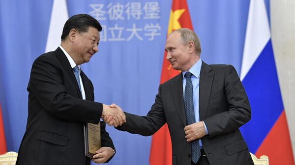 Председник Русије Владимир Путин и Кинески лидер Си Ђинпинг - Sputnik Србија