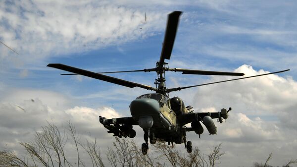 Вертолет Ка-52 ВС РФ на боевом вылете в зоне проведения специальной военной операции - Sputnik Србија