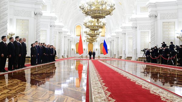 Председници Кине и Русије, Си Ђинпинг и Владимир Путин, на састанку у Москви - Sputnik Србија