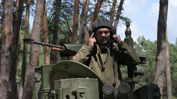 Ruski tenkista u zoni specijalne vojne operacije - Sputnik Srbija
