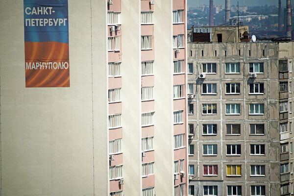 Обновљена стамбена зграда у Маријупољу. - Sputnik Србија