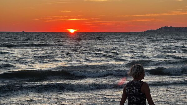Zalazak sunca na plaži - Sputnik Srbija