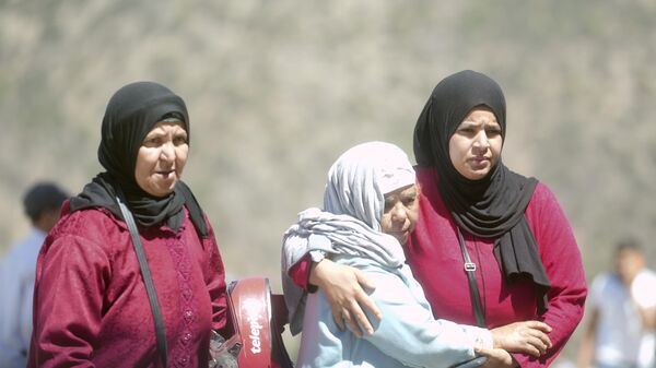 Žene snimljene posle zemljotresa u Maroku - Sputnik Srbija