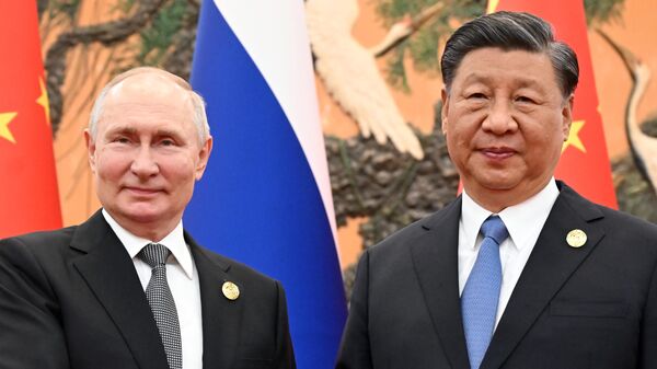 Председници Русије и Кине Владимир Путин и Си Ђинпинг - Sputnik Србија