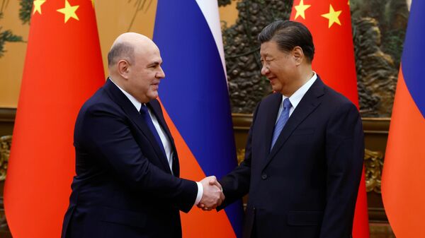 Radna poseta ruskog premijera Mihaila Mišustina Kini i sastanak sa kineskim predsednikom Si Đinpingom - Sputnik Srbija