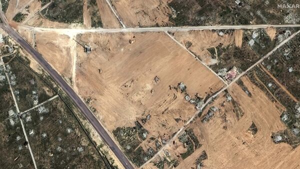 Сателитски снимак ограђеног подручје оивиченог високим бетонским зидовима дуж границе с Појасом Газе - Sputnik Србија