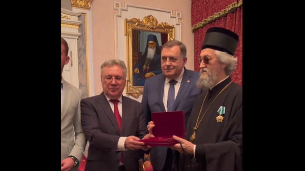 Putin odlikovao vladiku Jefrema Ordenom družbe - Sputnik Srbija