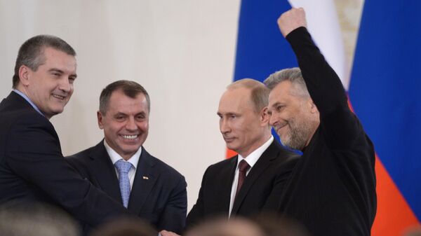 Президент РФ Владимир Путин в Кремле во время церемонии подписания договора между Российской Федерацией и Республикой Крым - Sputnik Србија