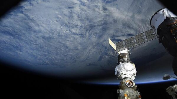 Солнечное затмение с борта МКС - Sputnik Србија