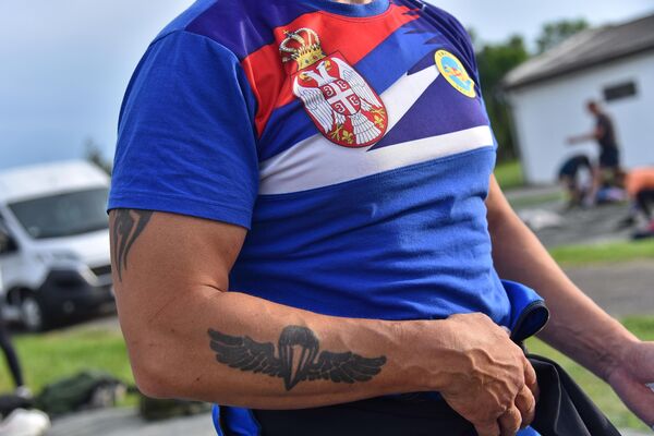 Тетоважа на руци једног од такмичара - Sputnik Србија