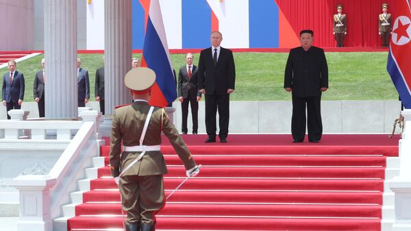 Predsednici Rusije i Severne Koreje Vladimir Putin i Kim Džong Un. - Sputnik Srbija