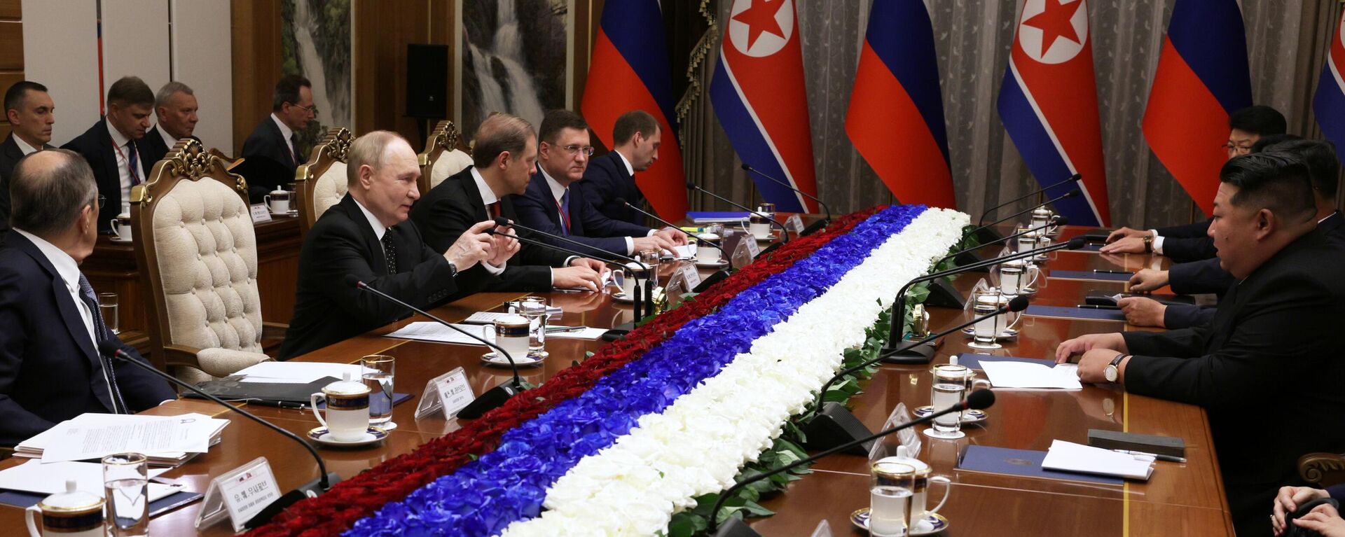 Predsednici Rusije i Severne Koreje Vladimir Putin i Kim Džong Un. - Sputnik Srbija, 1920, 18.06.2024
