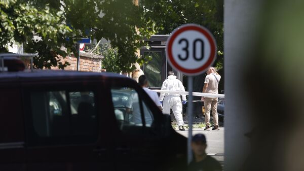 Увиђај после напада испред Амбасаде Израела у Београду - Sputnik Србија