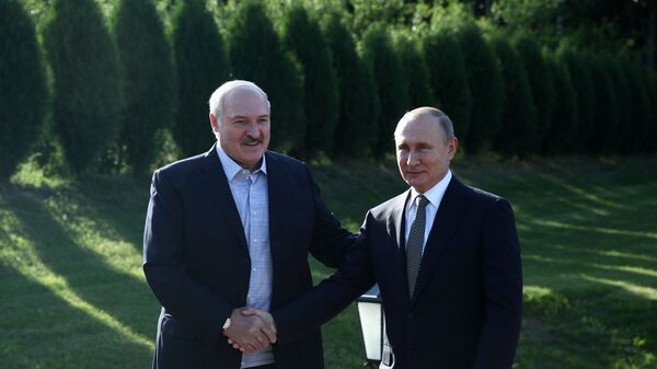 Президент России Владимир Путин и президент Белоруссии Александр Лукашенко во время встречи в Минске - Sputnik Србија