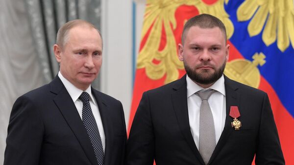 Ruski predsednik Vladimir Putin i Evgenije Podubni  - Sputnik Srbija