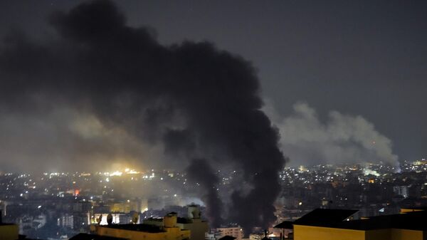 Smoke rises from Israeli airstrikes in Beirut's southern suburbs, Lebanon, Saturday, Sept. 28, 2024.  - Sputnik Srbija