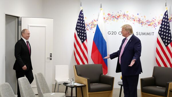 Путин и Трамп, архивска фотографија из 2019. године - Sputnik Србија