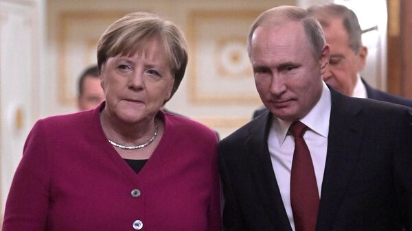 Bivša nemačka kancelarka Angela Merkel i predsednik Rusije Vladimir Putin - Sputnik Srbija