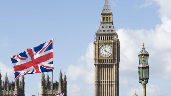 Big Ben i zastava Velike Britanije u Londonu - Sputnik Srbija