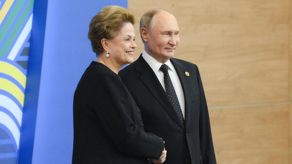 Ruski predsednik sa šefom Nove razvojne banke Dilmom Rusef - Sputnik Srbija