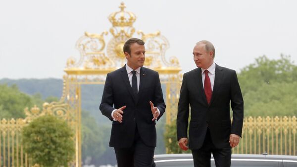 Emanuel Makron i Vladimir Putin - Sputnik Srbija