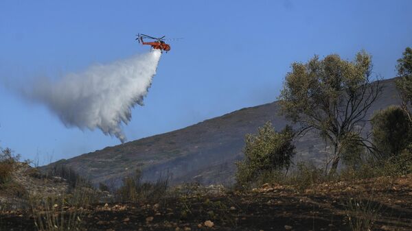 Gašenje požara u Grčkoj. - Sputnik Srbija