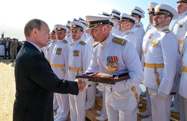 Председник Руске Федерације Владимир Путин учествовао је средином јула у церемонији подизања заставе на нуклеарној подморници 'Кнез Пожарски' у Северодвинску. Председник Руске Федерације Владимир Путин учествовао је средином јула у церемонији подизања заставе на нуклеарној подморници 'Кнез Пожарски' у Северодвинску. - Sputnik Србија