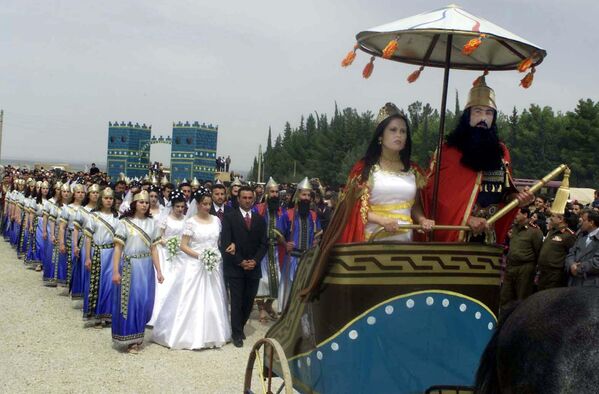 Колективно венчање у у провинцији Хасака у Сирији. Венчања означавају почетак нове асирске 6752. године. . Колективно венчање у у провинцији Хасака у Сирији. Венчања означавају почетак нове асирске 6752. године. . - Sputnik Србија