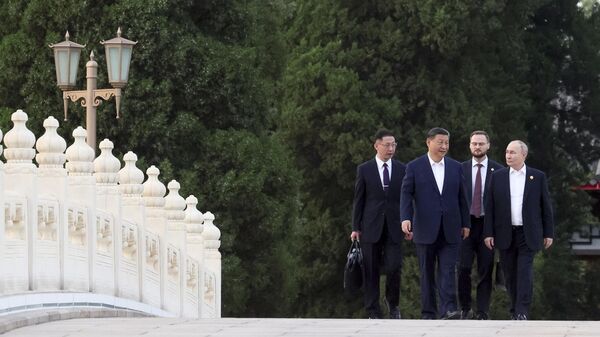 Си Ђинпинг и Владимир Путин - Sputnik Србија