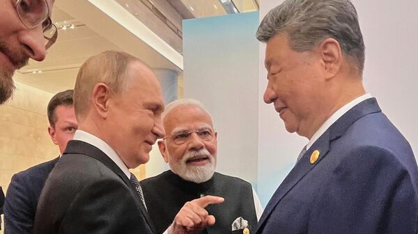 Prezident RF Vladimir Putin, premьer-ministr Indii Narendra Modi i predsedatelь KNR Si Czinьpin pered načalos sammita ŠOS v Tяnьczine - Sputnik Srbija