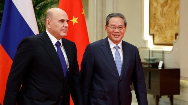 Руски премијер Михаил Мишустин и кинески премијер Ли Ћијанг - Sputnik Србија
