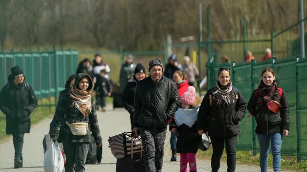 Građani Ukrajine nakon prelaska granice sa Poljskom - Sputnik Srbija