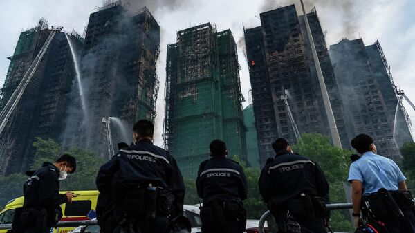 Požar u stambenom kompleksu u Hongkongu. - Sputnik Srbija