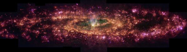 Ова слика приказује галаксију Вајар у новом светлу. Композиција лажних боја приказује специфичне таласне дужине светлости коју ослобађају водоник, азот, сумпор и кисеоник. Ружичаста светлост представља гас побуђен зрачењем новорођених звезда, док је конус беље светлости у центру узрокован одливом гаса покретаним интензивном епизодом звезданог праска која се одвија у центру галаксије. - Sputnik Србија