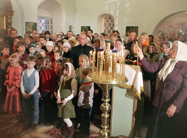 Председник Русије Владимир Путин током божићне литургије у Воскресенском Ново-Јерусалимском манастиру - Sputnik Србија