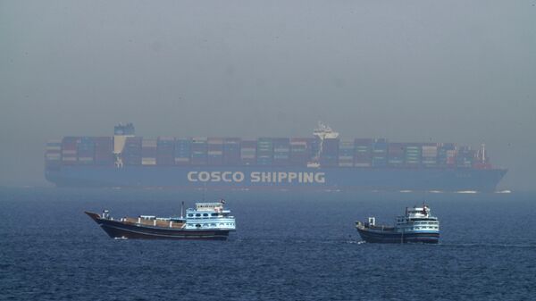 Архивска фотографија од 19. маја 2023. Теретни брод у Ормуском мореузу - Sputnik Србија