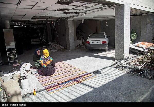 Posledice napada Sjedinjenih Država i cionističkog režima na stambena područja u Kermanšahu. - Sputnik Srbija