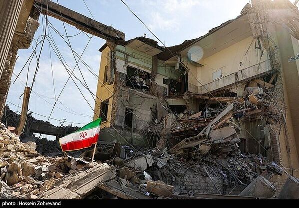 Posledice napada Sjedinjenih Država i cionističkog režima na stambene objekte u centru Teherana. - Sputnik Srbija