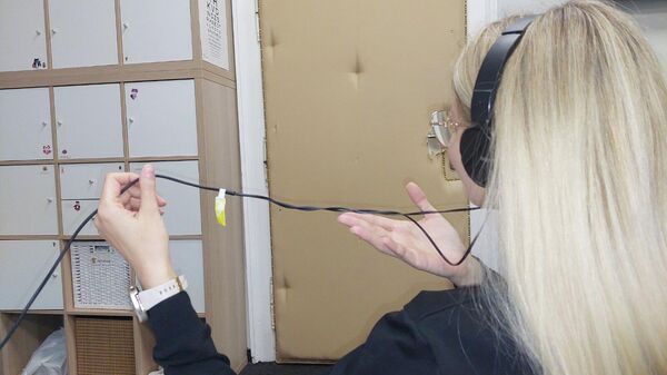 жичане слушалице - Sputnik Србија