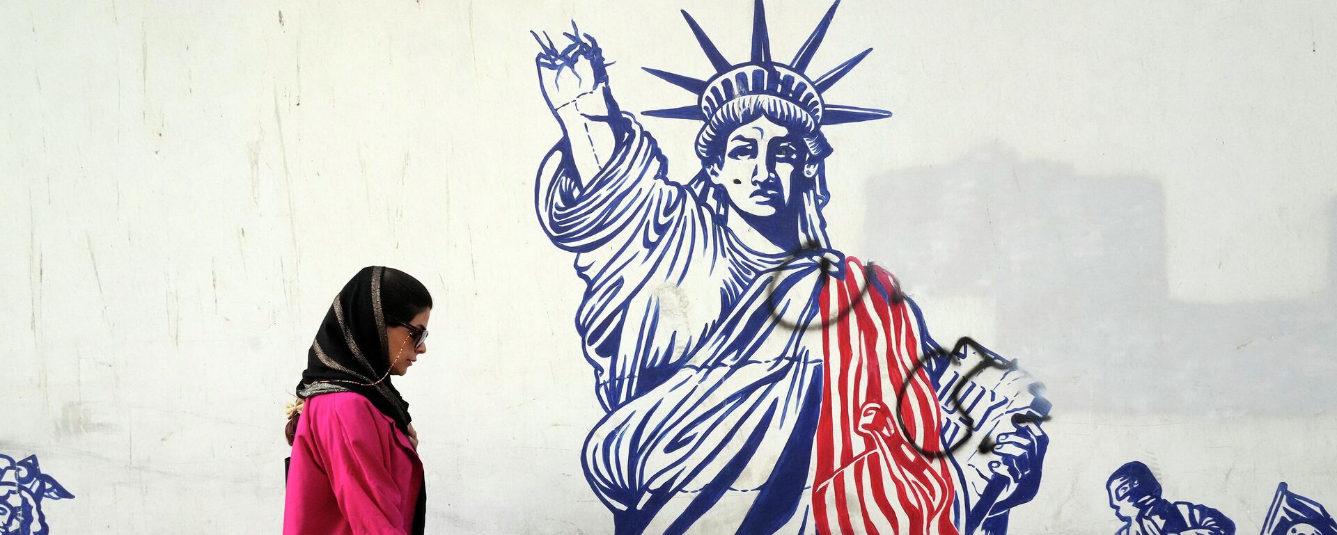 Mural ispred bivše američke ambasade u Teheranu  - Sputnik Srbija, 1920, 08.04.2026