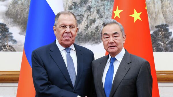 Министри спољних послова Русије и Кине, Сергеј Лавров и Ванг Ји Министри спољних послова Русије и Кине, Сергеј Лавров и Ванг Ји - Sputnik Србија