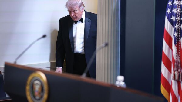 President Donald Trump arrives at the James Brady Press Briefing Room at the White House after an unspecified threat at the annual White House Correspondents' Association Dinner in Washington, Saturday, April 25, 2026. - Sputnik Srbija