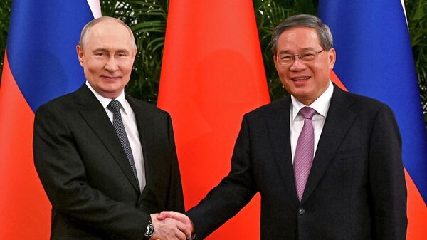 Путин са премијером Кине: Постављени нови амбициозни циљеви за развој партнерства две земље /видео/